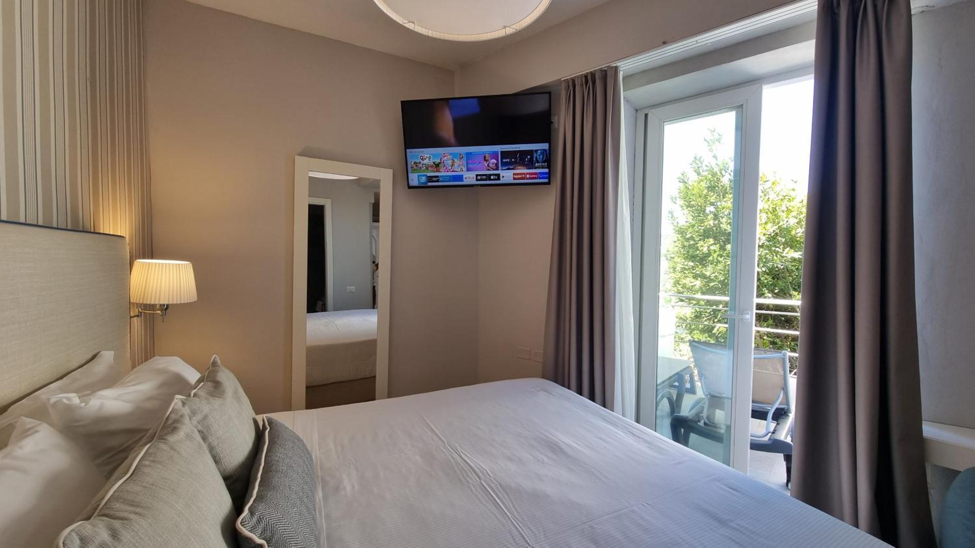 Hotel Plaza Porto Azzurro Chambre photo